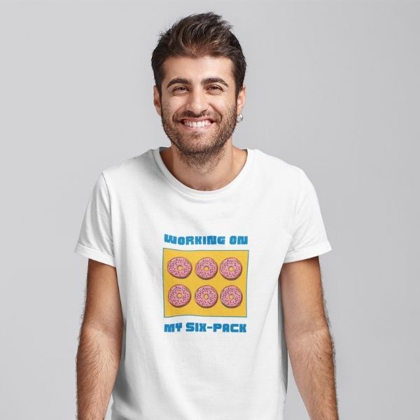 working on six pack men graphic tees white tees