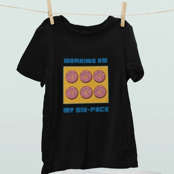 working on six pack men graphic tees